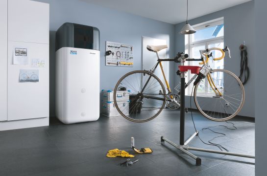 ROTEX GCU compact Ambiente in einer Garage hinter einem Fahrrad